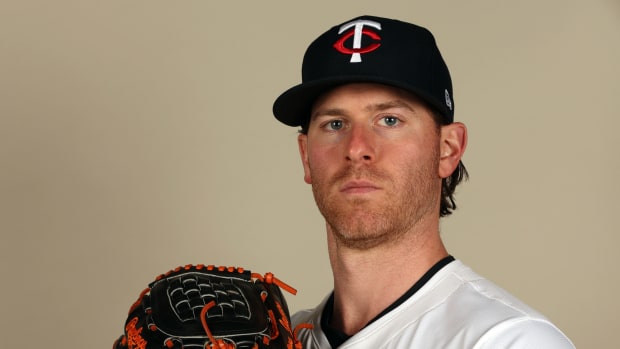 Minnesota Twins starting pitcher Anthony DeSclafani (21) poses for a photo during photo day at Hammond Stadium in Lee County, Fla., on Feb. 22, 2024.